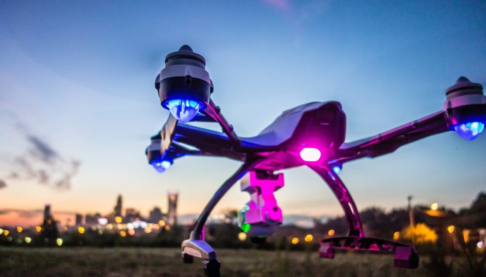drone on foreground of mdern city skyline drone on foreground of mdern city skyline